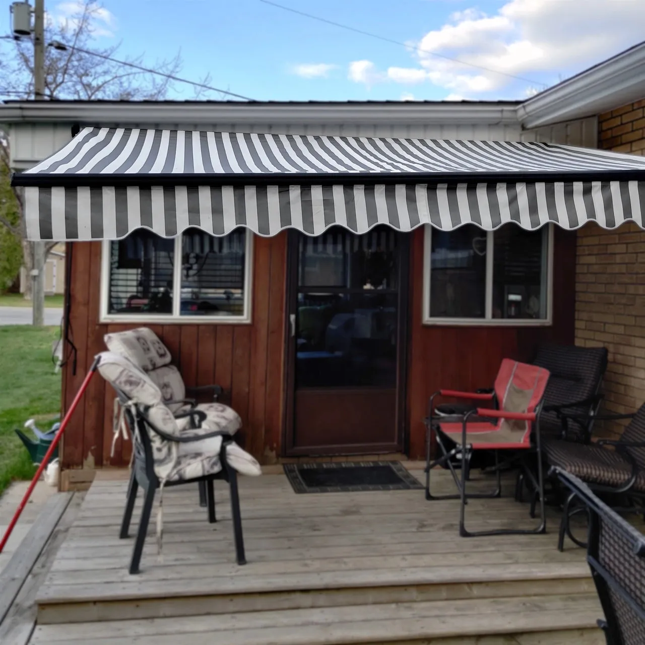 Aleko Motorized Retractable Black Frame Patio Awning 20 x 10 Feet - Gray and White Stripes