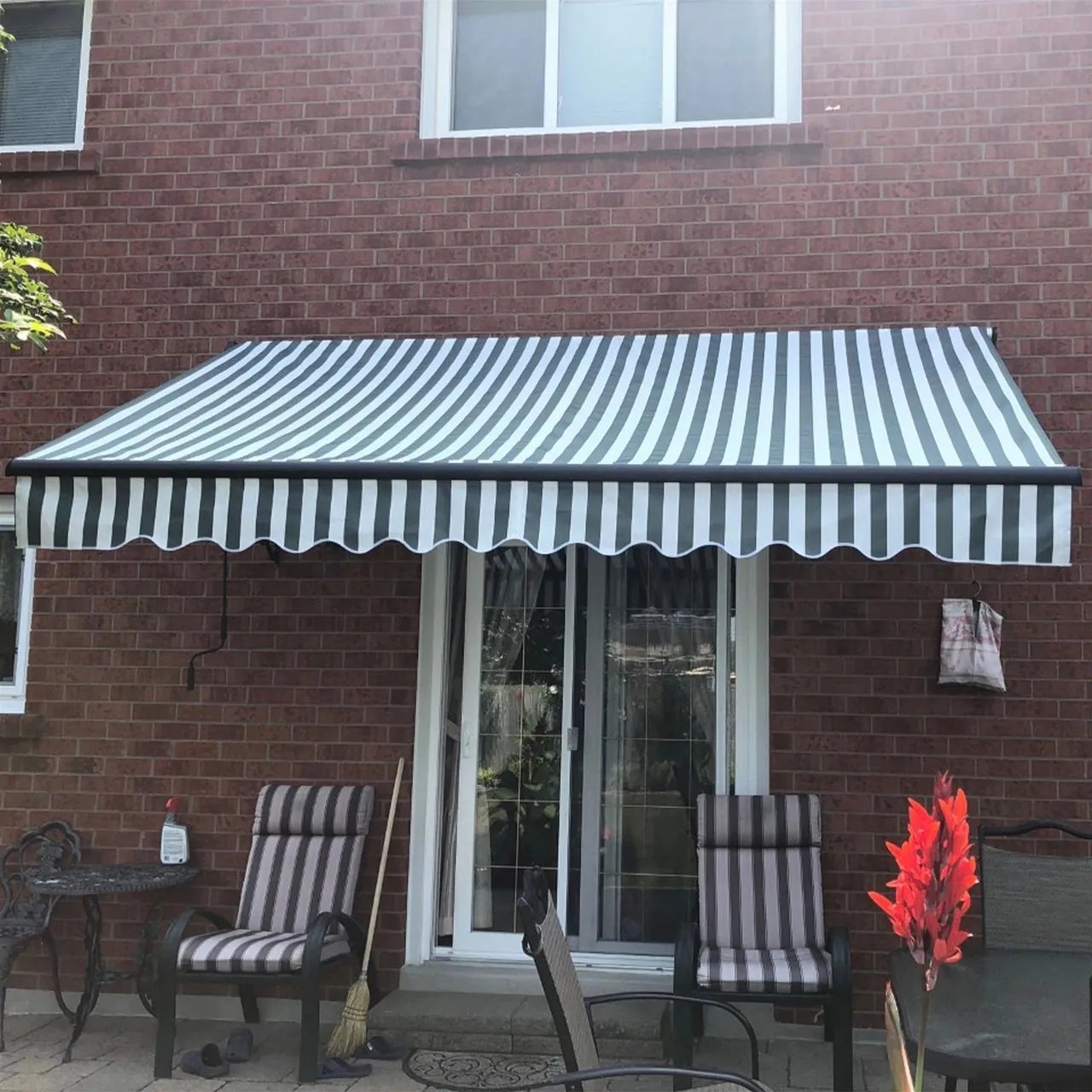 Aleko Motorized Retractable Black Frame Patio Awning 20 x 10 Feet - Gray and White Stripes