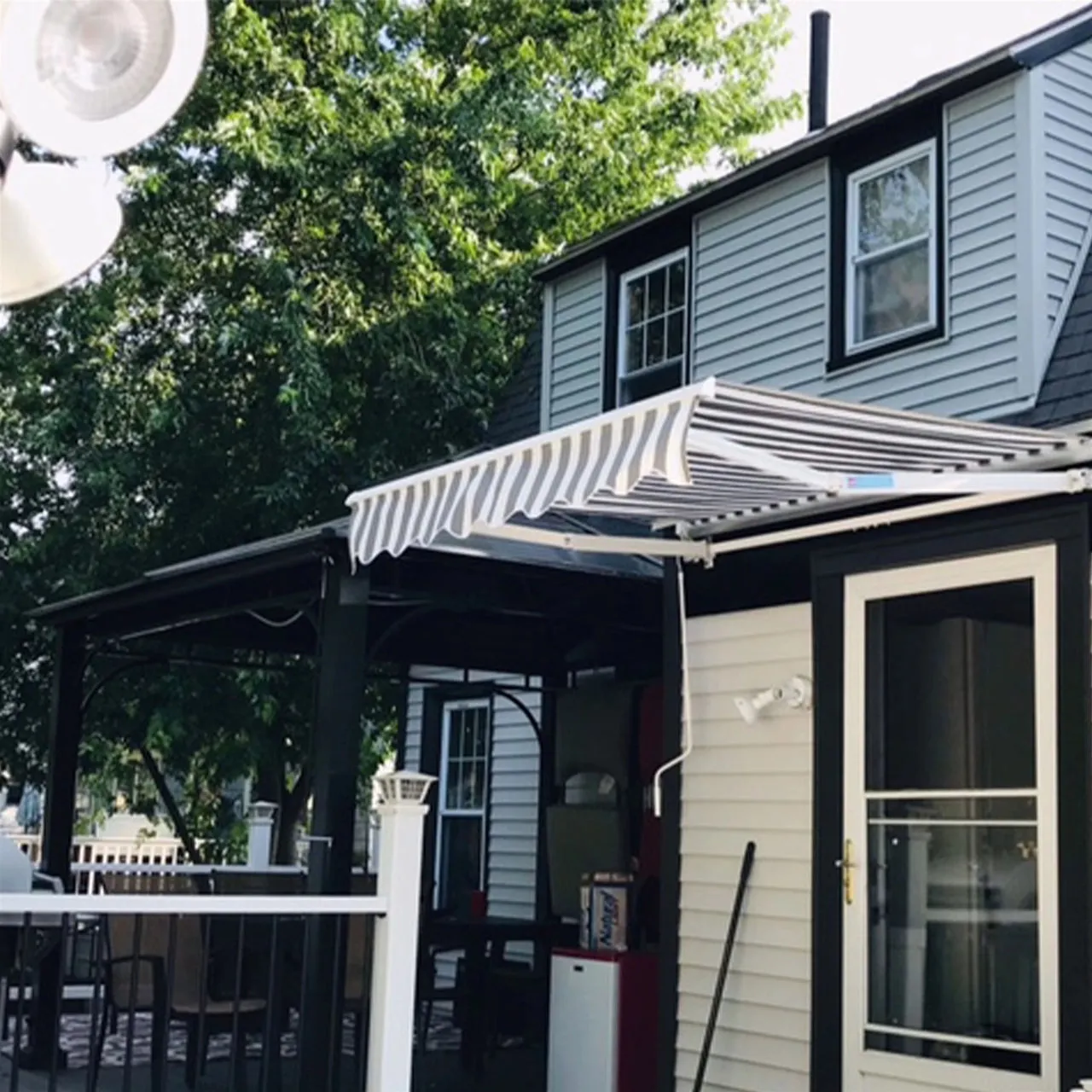 Aleko Motorized Retractable White Frame Patio Awning 12 x 10 Feet - Gray and White Striped
