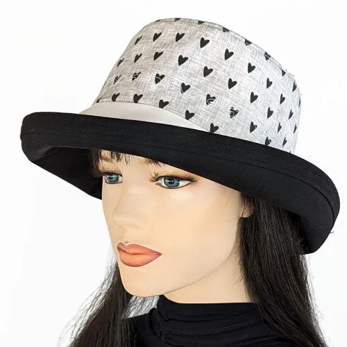 Sunblocker UV sun hat with wide brim, black hearts on grey, adjustable fit